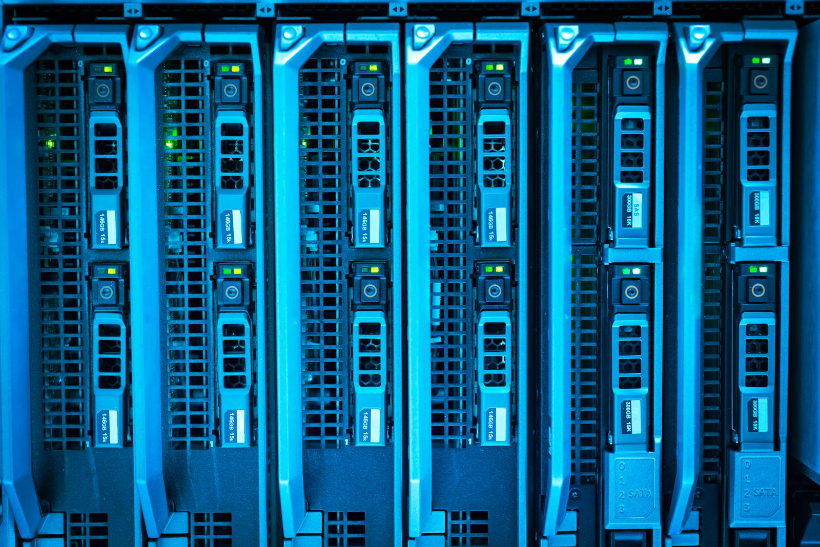 Photo by panumas nikhomkhai Detailed image of illuminated server racks showcasing modern technology infrastructure.